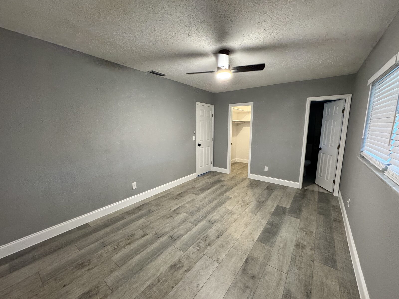 Bedroom with closet and hallway access