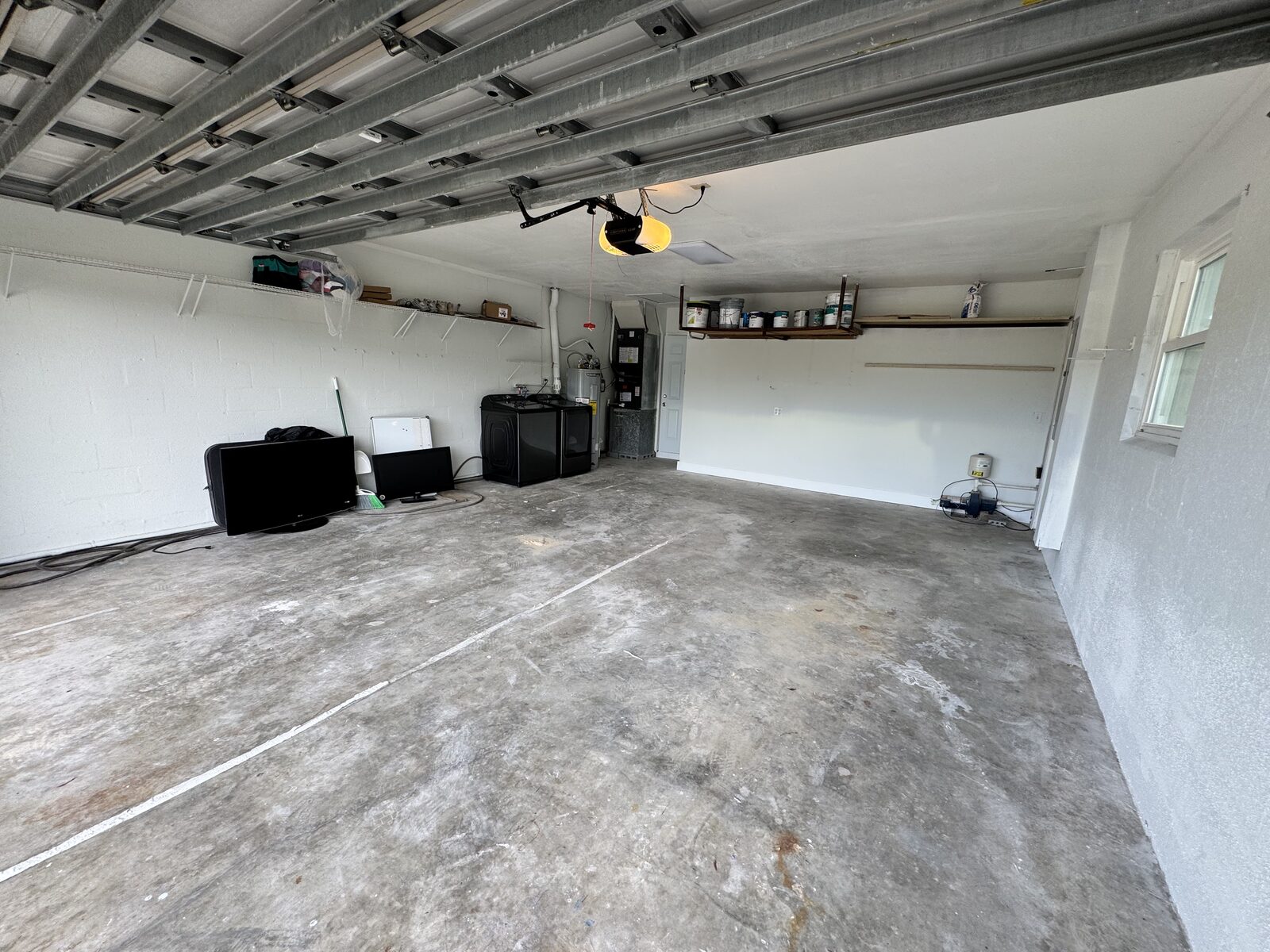Oversized two-car garage with epoxy-ready concrete floor